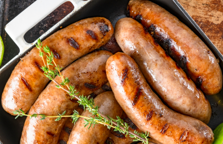 Sausage cooking in a pan